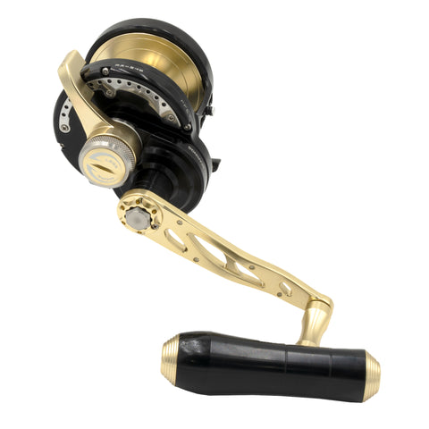 A black and gold spinning fishing reel with a matching gold handle and black grip, shown on a plain white background.