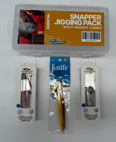 Ocean Anchor Snapper Jigging Pack multi-weight combo set, including a clear plastic storage case with an orange label and three individual packages of micro lures: Weasel Micro 3G on the left, a yellow and red jig in the center, and Wreck Micro 3G on the right.