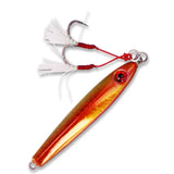 A fishing lure with a metallic orange and yellow body, a red eye, and two white feathered jigs attached by red cords on a white background.